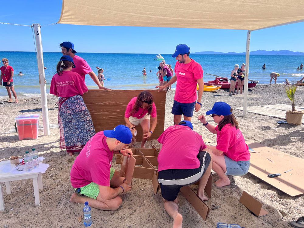 Cardboard-boating by the sea: a dynamic and engaging summer team building activity - 0